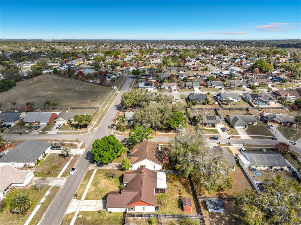 2843 Danforth Drive Orlando, FL 32818 - Photo 40 of 41 an aerial view of residential houses with outdoor space