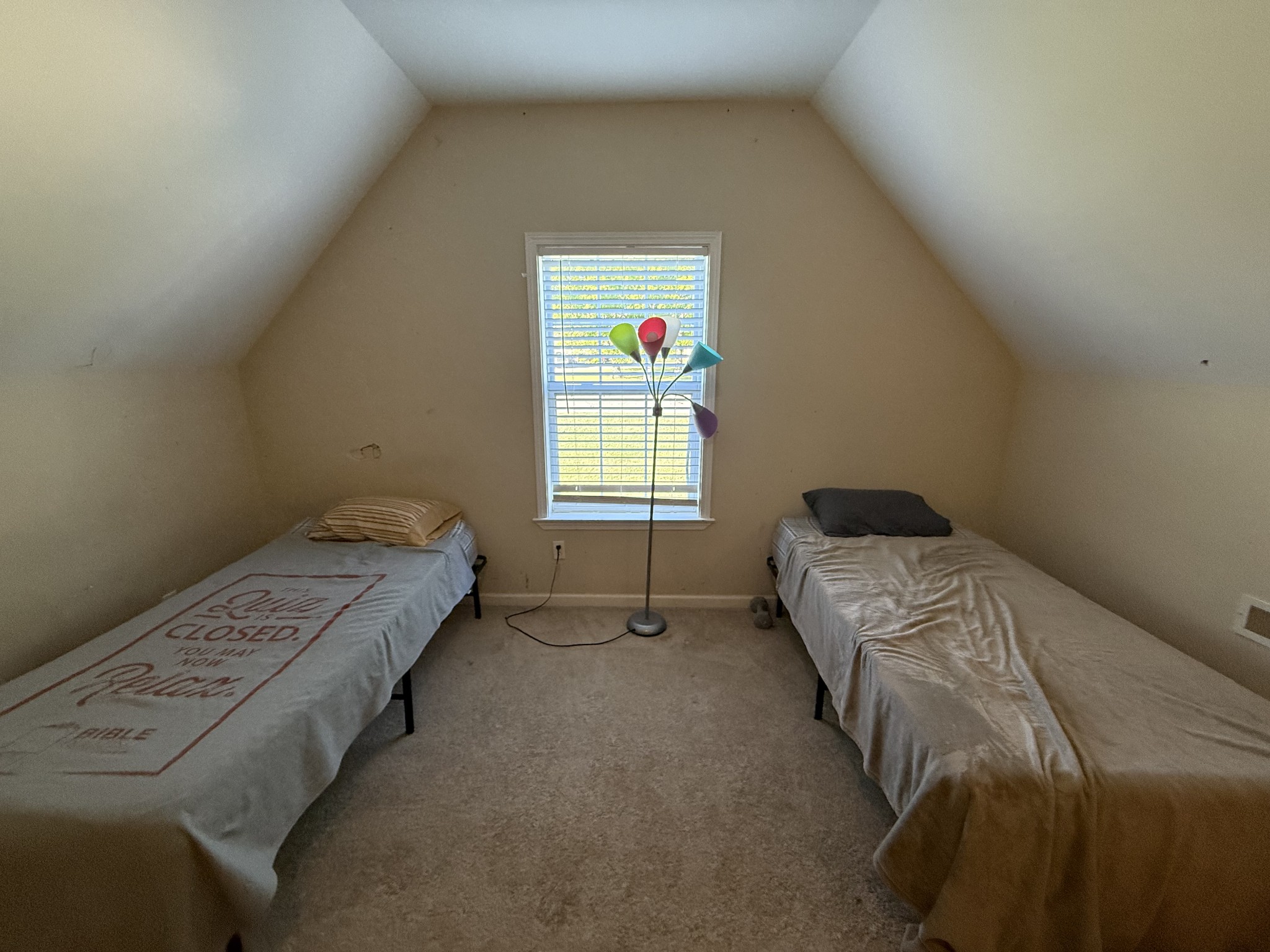 1702 Abiff Road Burns, TN 37029 - Photo 44 of 47 a bedroom with a bed and a window