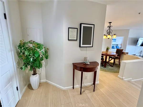 a living room with furniture rug and window