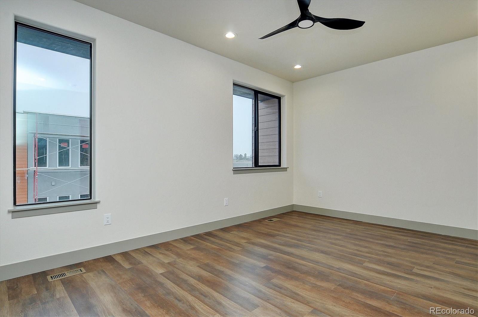 6398 Cleora Road, Unit F Salida, CO 81201 - Photo 23 of 34 wooden floor in an empty room with a window