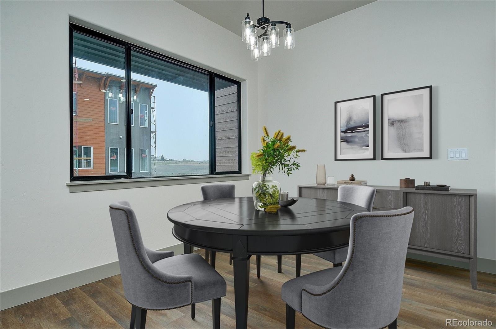 6398 Cleora Road, Unit F Salida, CO 81201 - Photo 5 of 34 a dining room with furniture and window