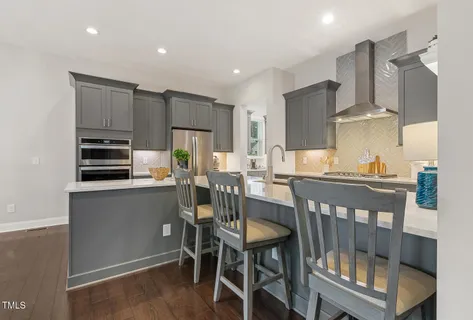 a bedroom with a bed and a lamp