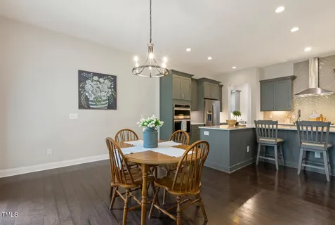 a room with a window and wooden floor
