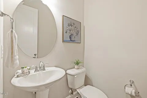 a living room with fireplace furniture and a flat screen tv