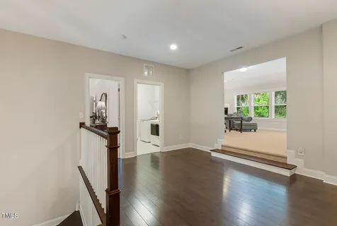 a work room with furniture and a window