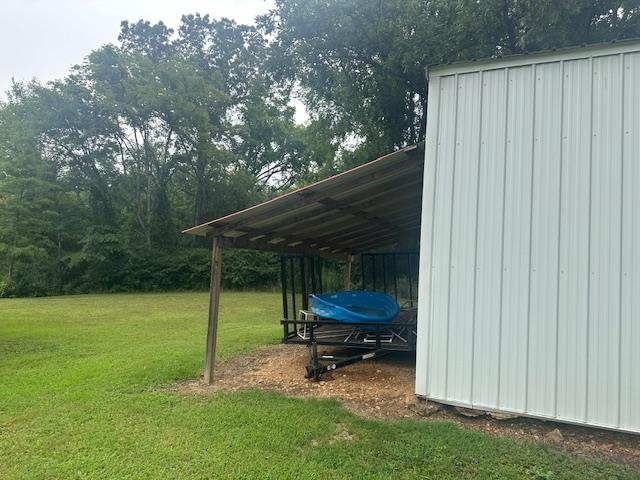 440 Angotti Road Crump, TN 38327 - Photo 23 of 30 View of outbuilding with a lawn