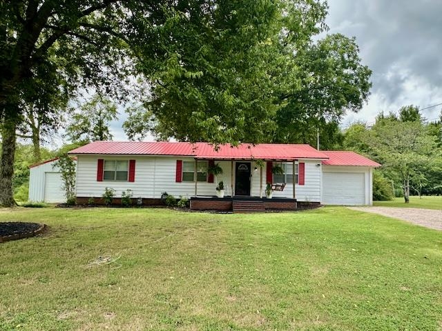 440 Angotti Road Crump, TN 38327 - Photo 30 of 30 Ranch-style home with a front yard