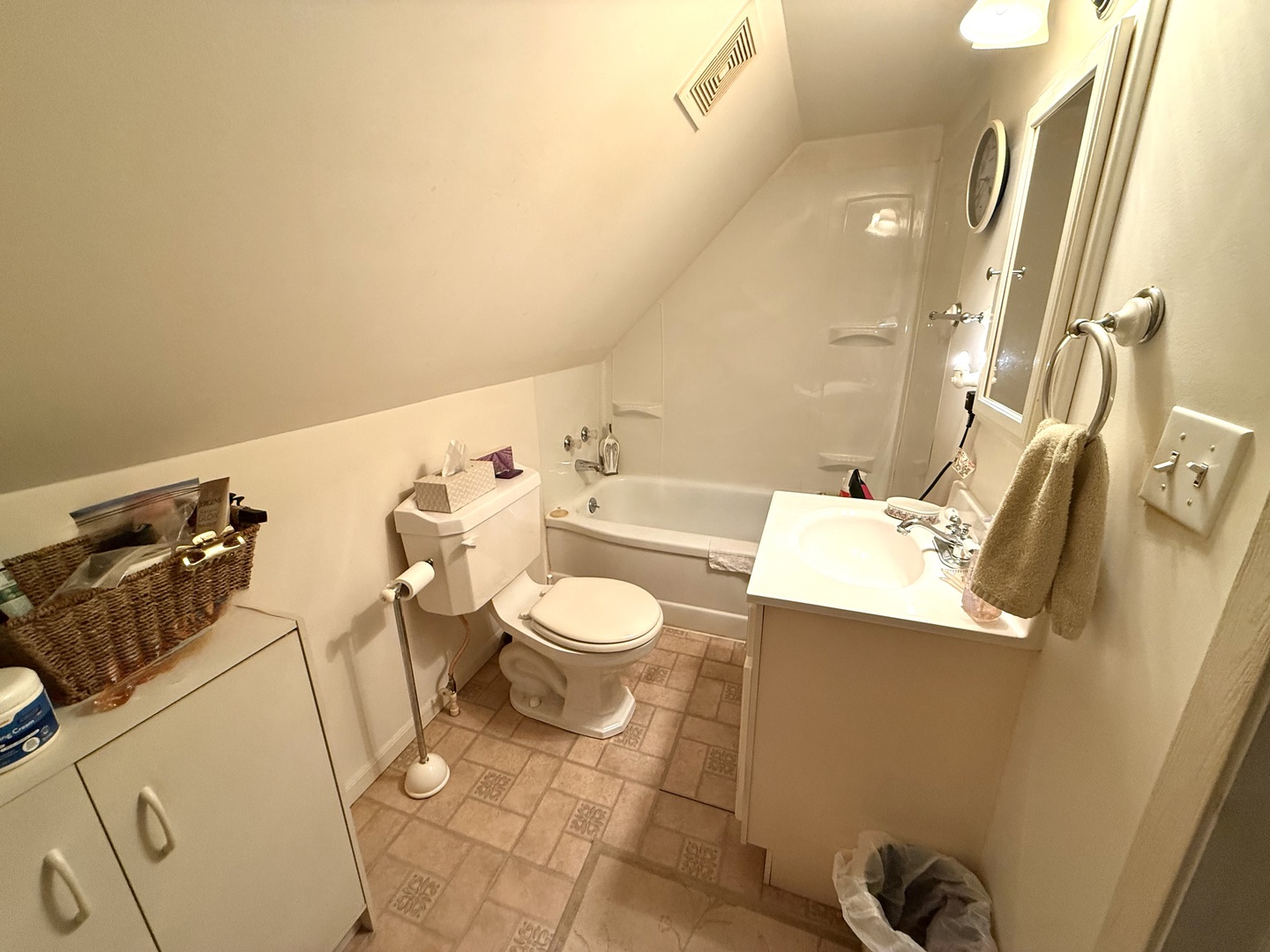 601 Ohio Street Grand Chain, IL 62941 - Photo 21 of 31 a bathroom with a sink mirror vanity and toilet