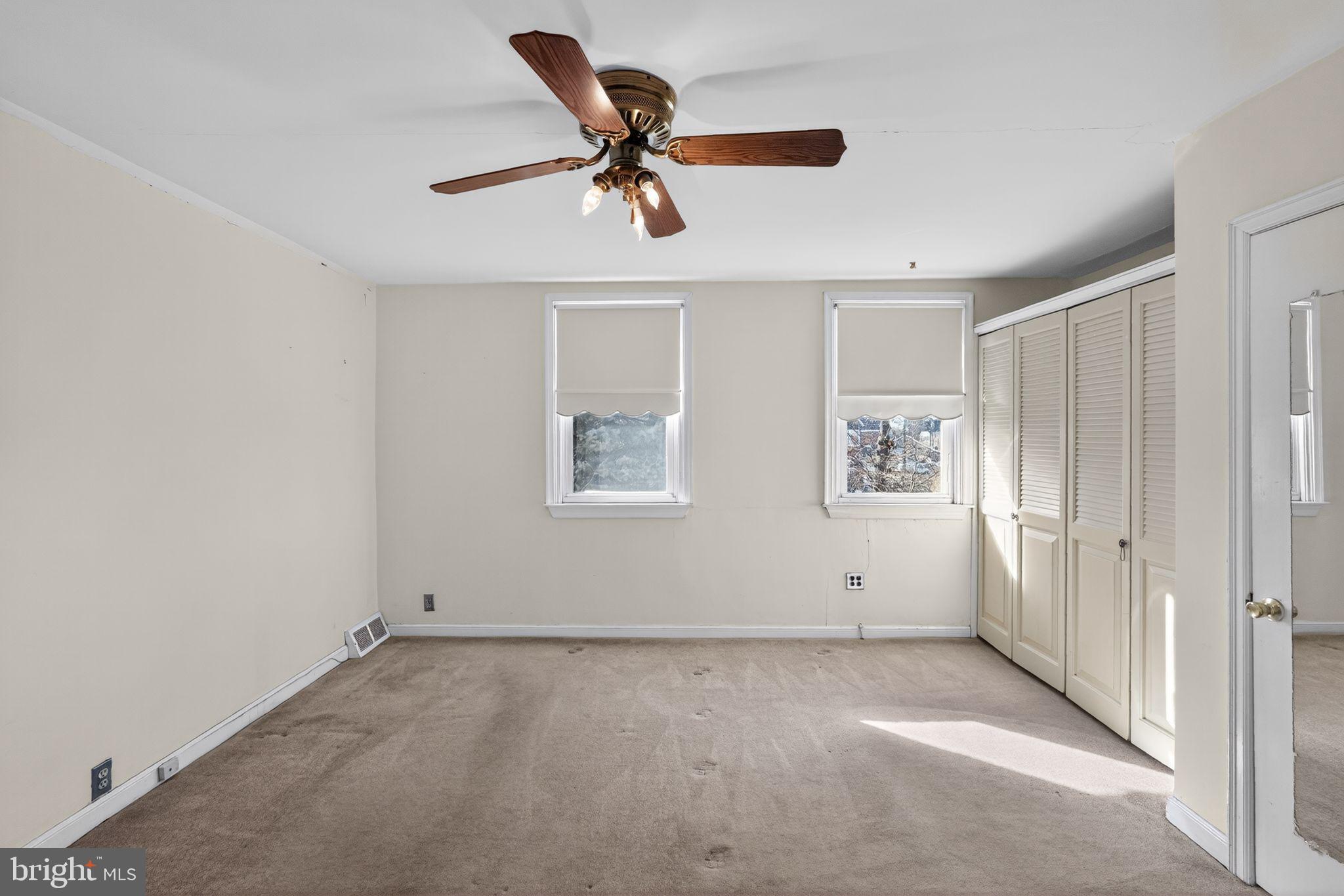 1017 Tyson Avenue Philadelphia, PA 19111 - Photo 17 of 23 a view of a livingroom with a ceiling fan and window