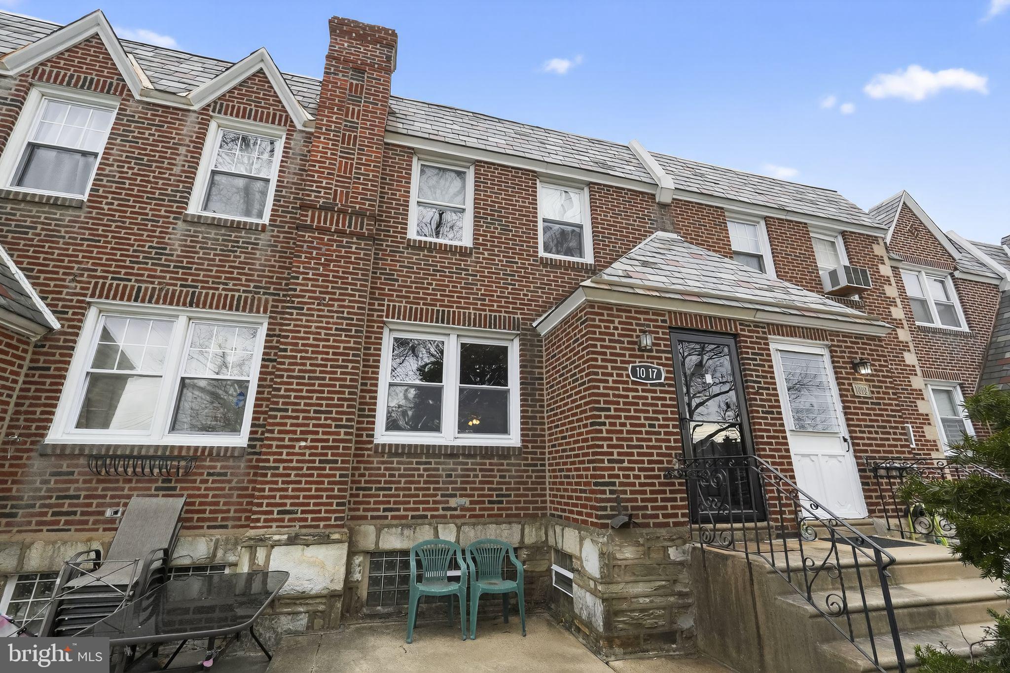 1017 Tyson Avenue Philadelphia, PA 19111 - Photo 2 of 23 a front view of a house with a yard
