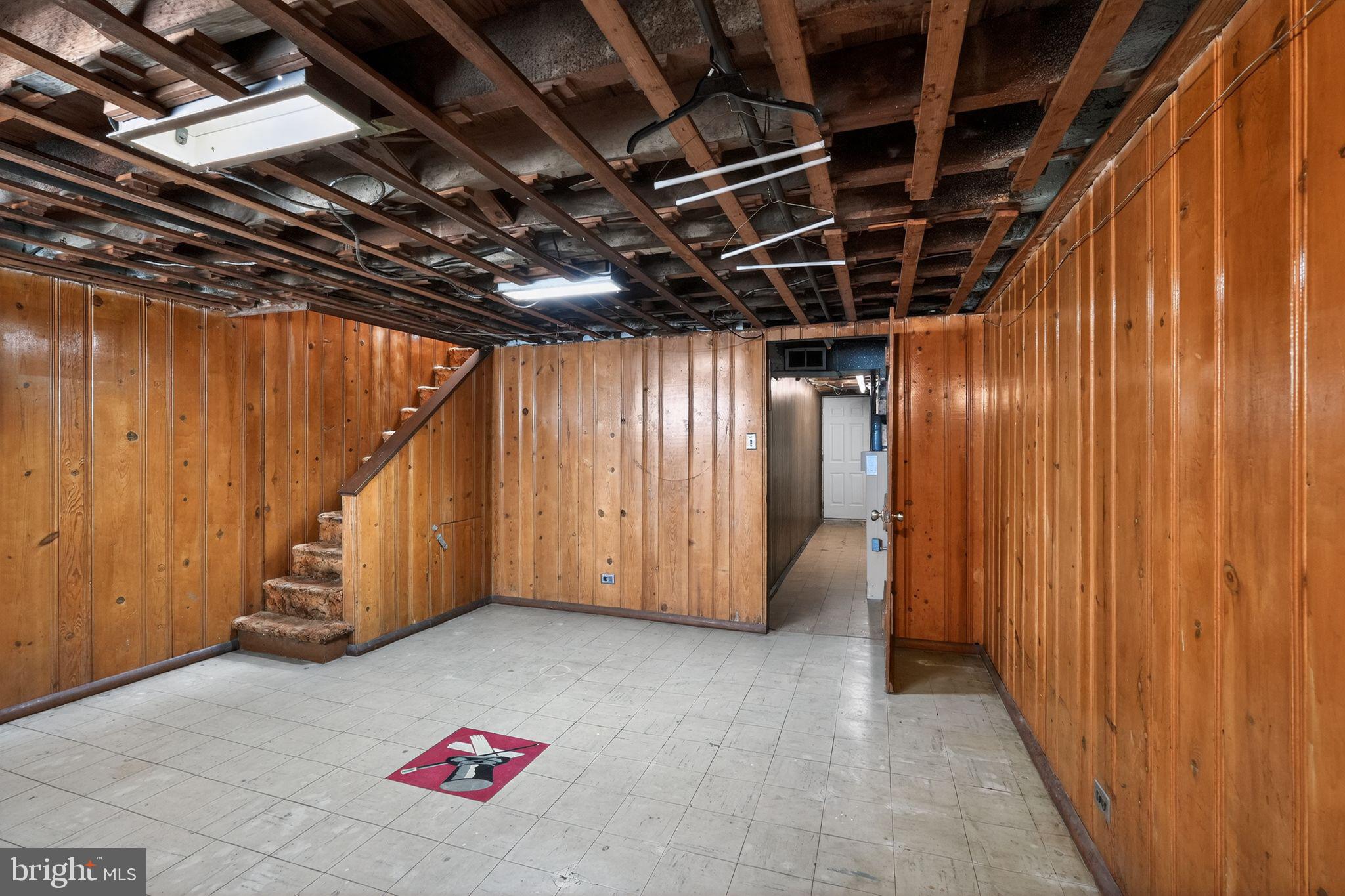 1017 Tyson Avenue Philadelphia, PA 19111 - Photo 21 of 23 a view of an empty room with wooden walls