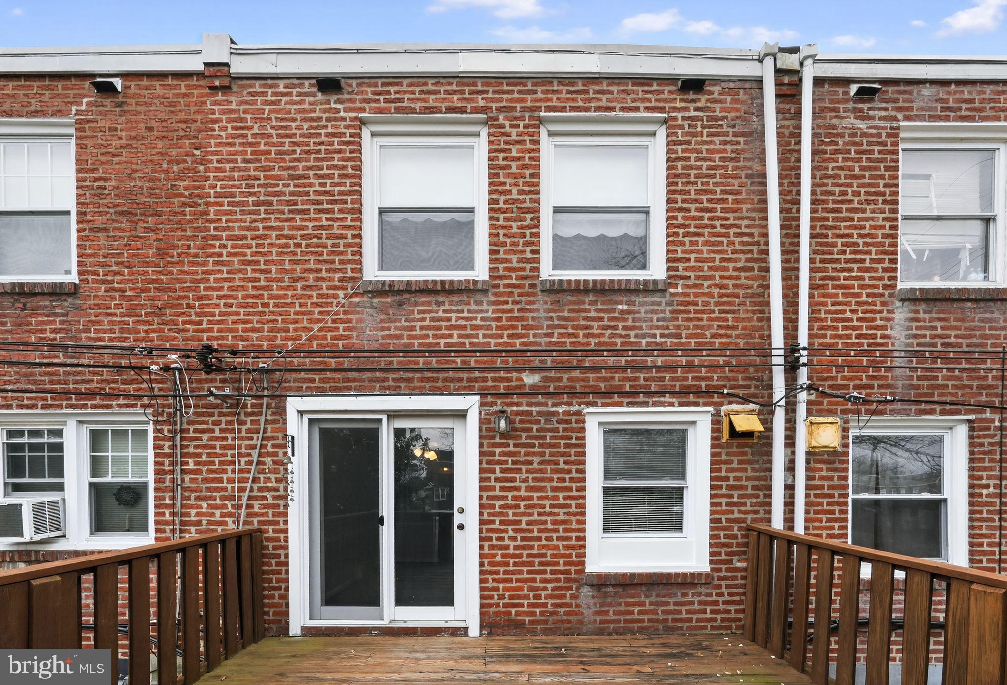 1017 Tyson Avenue Philadelphia, PA 19111 - Photo 23 of 23 a view of a brick house with a large windows