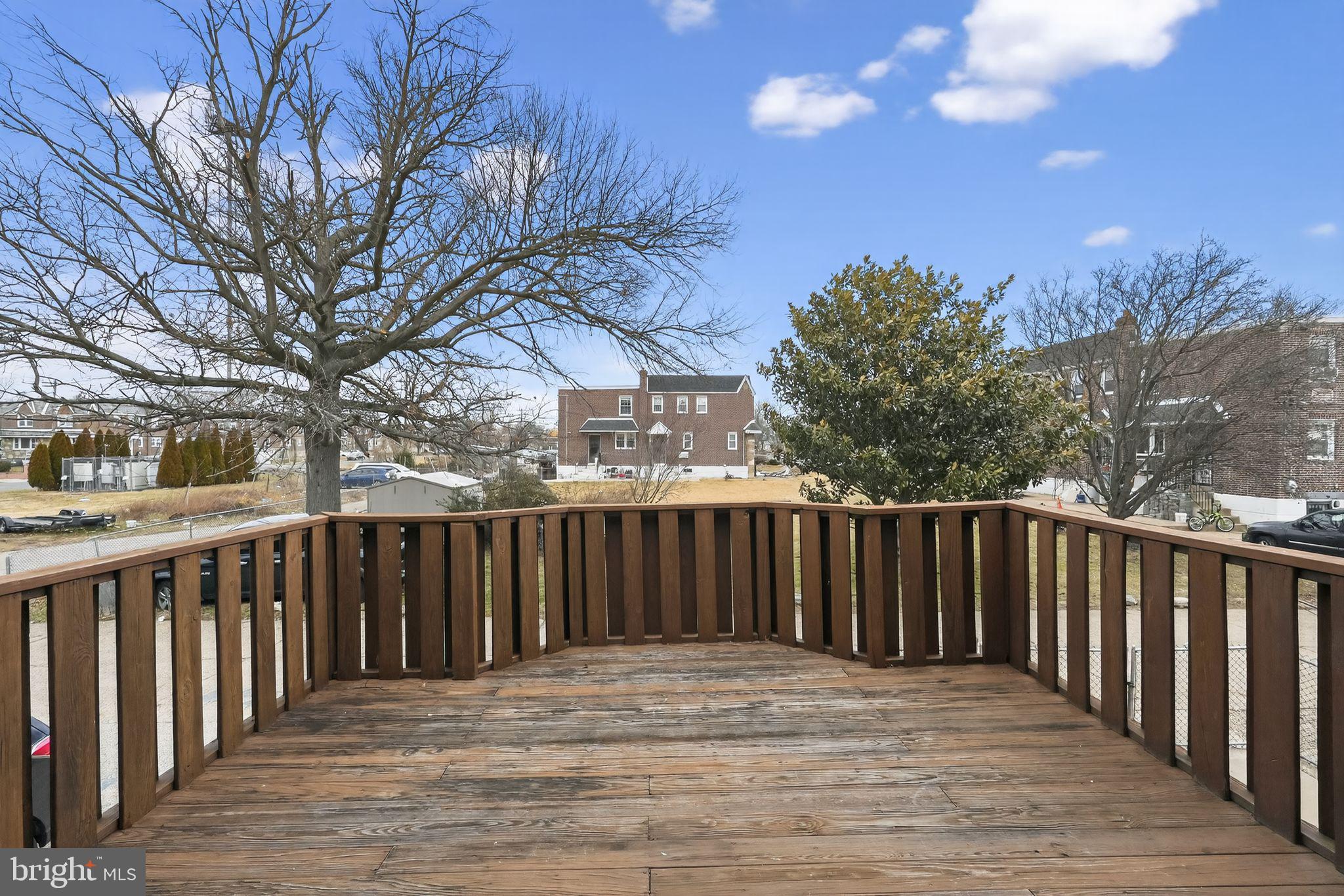 1017 Tyson Avenue Philadelphia, PA 19111 - Photo 4 of 23 a view of a wooden roof deck