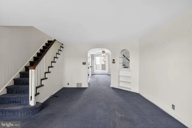 a view of a livingroom with white walls