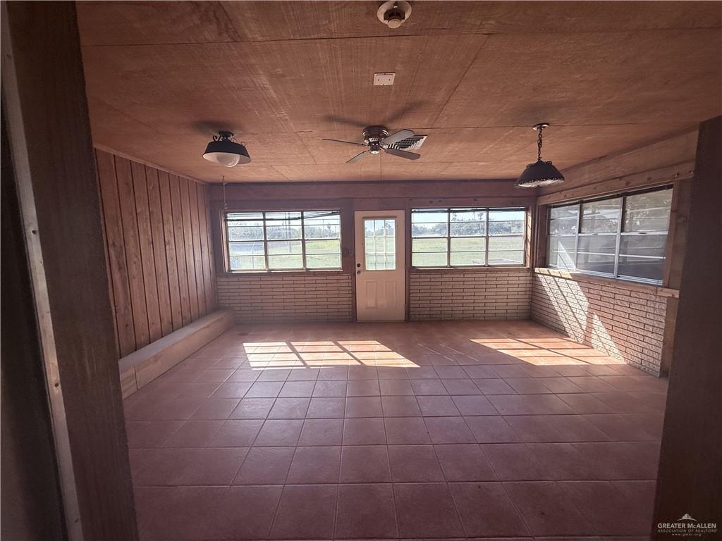 5300 East Richardson Road Edinburg, TX 78542 - Photo 4 of 12 a view of empty room with windows