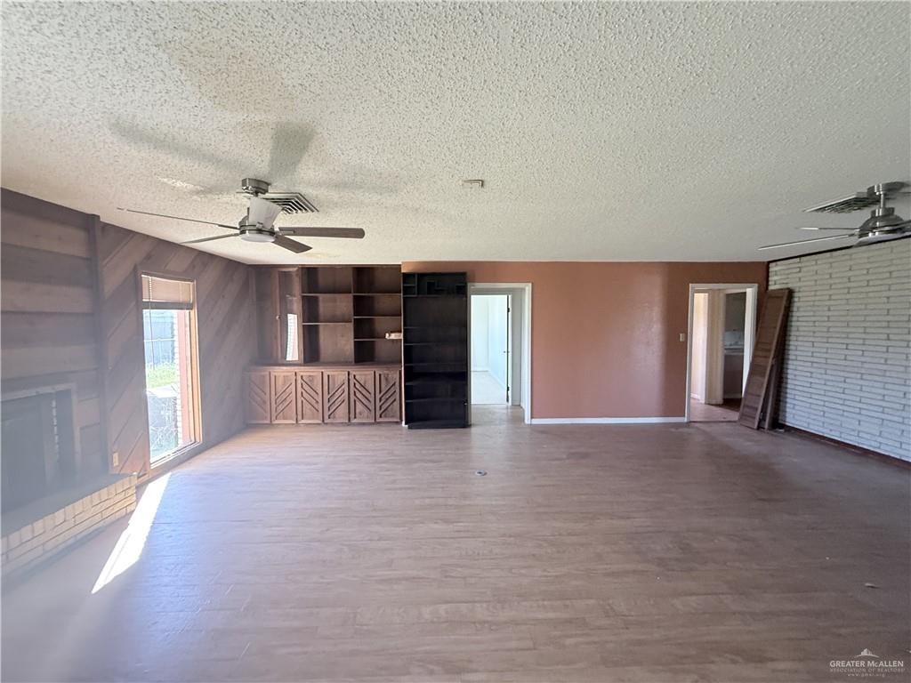 5300 East Richardson Road Edinburg, TX 78542 - Photo 9 of 12 a view of an empty room with a window