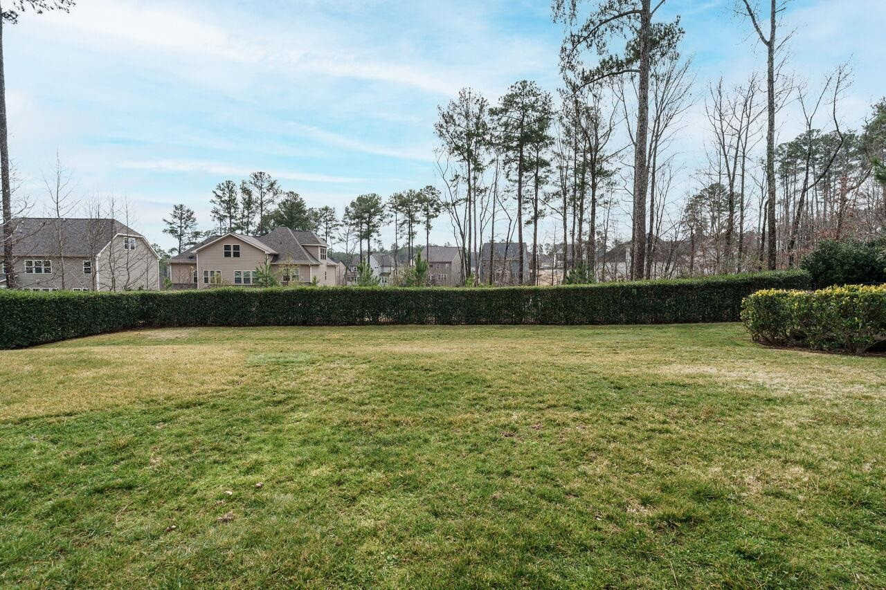5327 Landguard Drive Raleigh, NC 27613 - Photo 44 of 45 Plenty of room to entertain in this backyard! Backyard