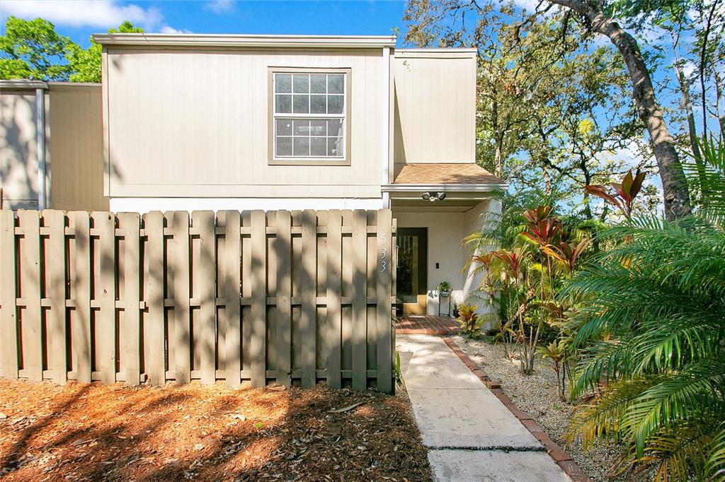 533 Moree Loop Winter Springs, FL 32708 - Photo 1 of 1 a view of a pathway of a house with wooden fence