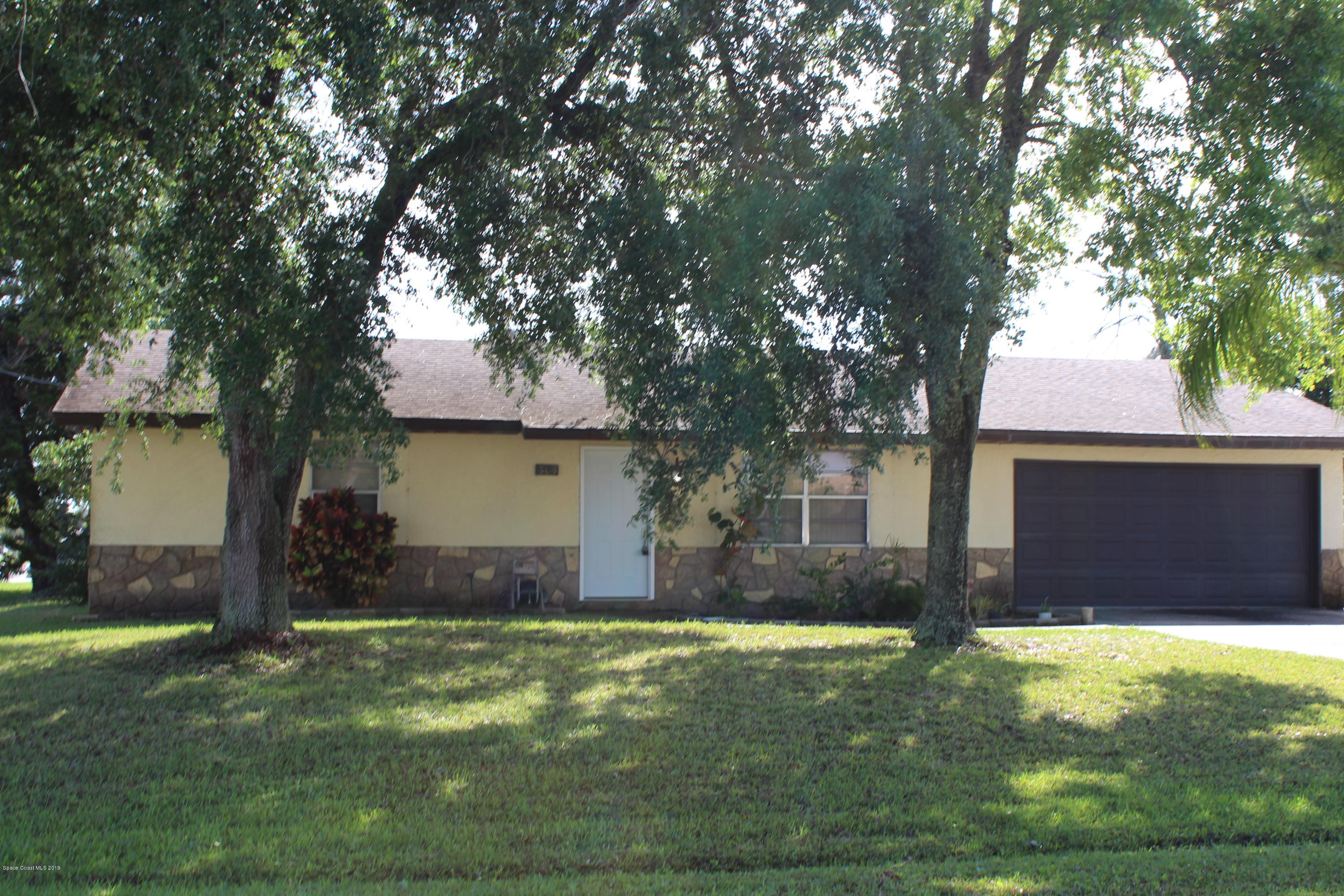 304 Trier Road Northwest Palm Bay, FL 32907 - Photo 1 of 16 front