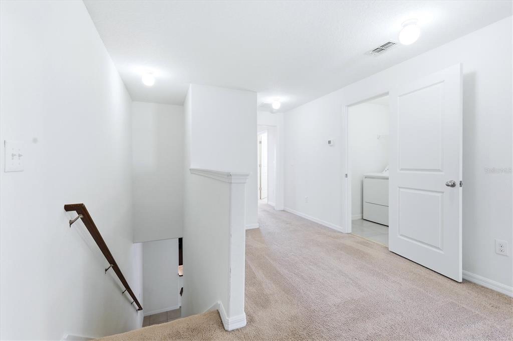 12909 Dream Catcher Way Riverview, FL 33579 - Photo 16 of 32 a view of hallway with stairs