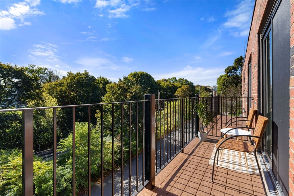 22 Branchfield Street, Unit D1 Boston, MA 02124 - Photo 2 of 20 a view of balcony with furniture