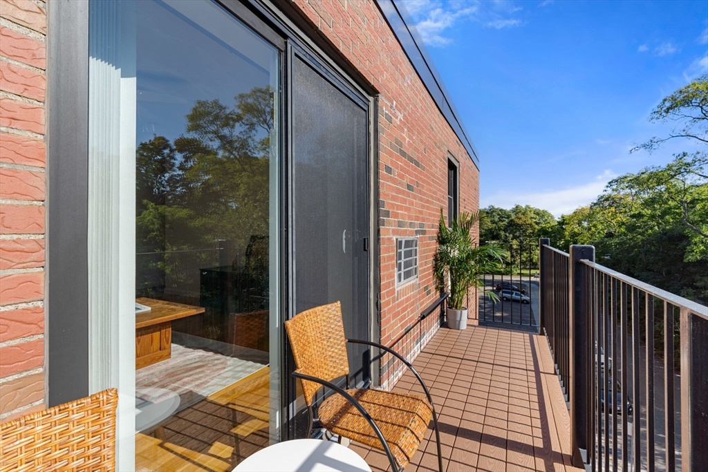 22 Branchfield Street, Unit D1 Boston, MA 02124 - Photo 4 of 20 a view of balcony with a potted plant