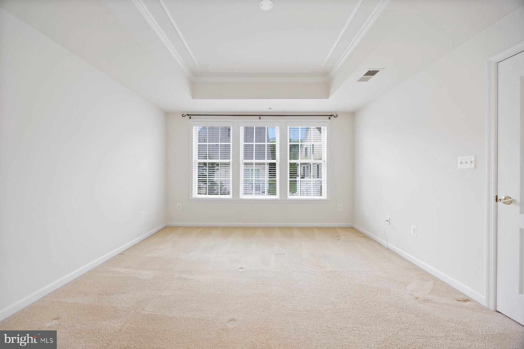 840 Horseshoe Lane, Unit 171 Taneytown, MD 21787 - Photo 18 of 37 an empty room with a window