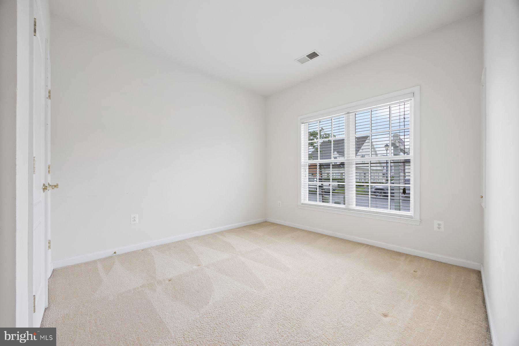 840 Horseshoe Lane, Unit 171 Taneytown, MD 21787 - Photo 24 of 37 a view of an empty room with a window