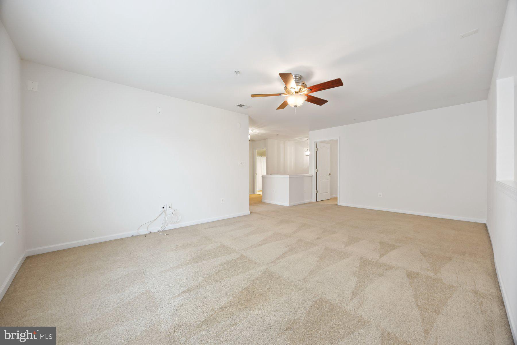 840 Horseshoe Lane, Unit 171 Taneytown, MD 21787 - Photo 28 of 37 a view of empty room with ceiling fan