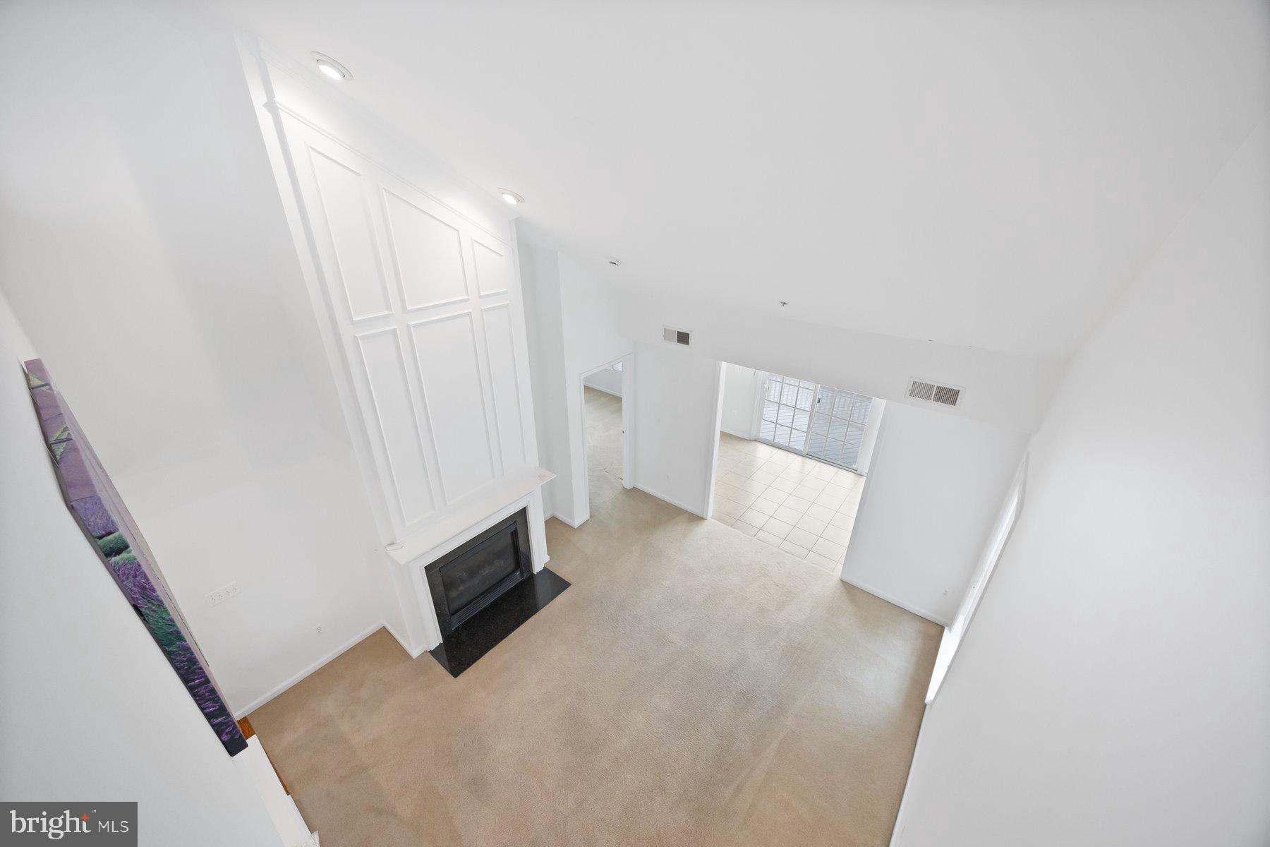 840 Horseshoe Lane, Unit 171 Taneytown, MD 21787 - Photo 29 of 37 a view of a livingroom with wooden floor and staircase