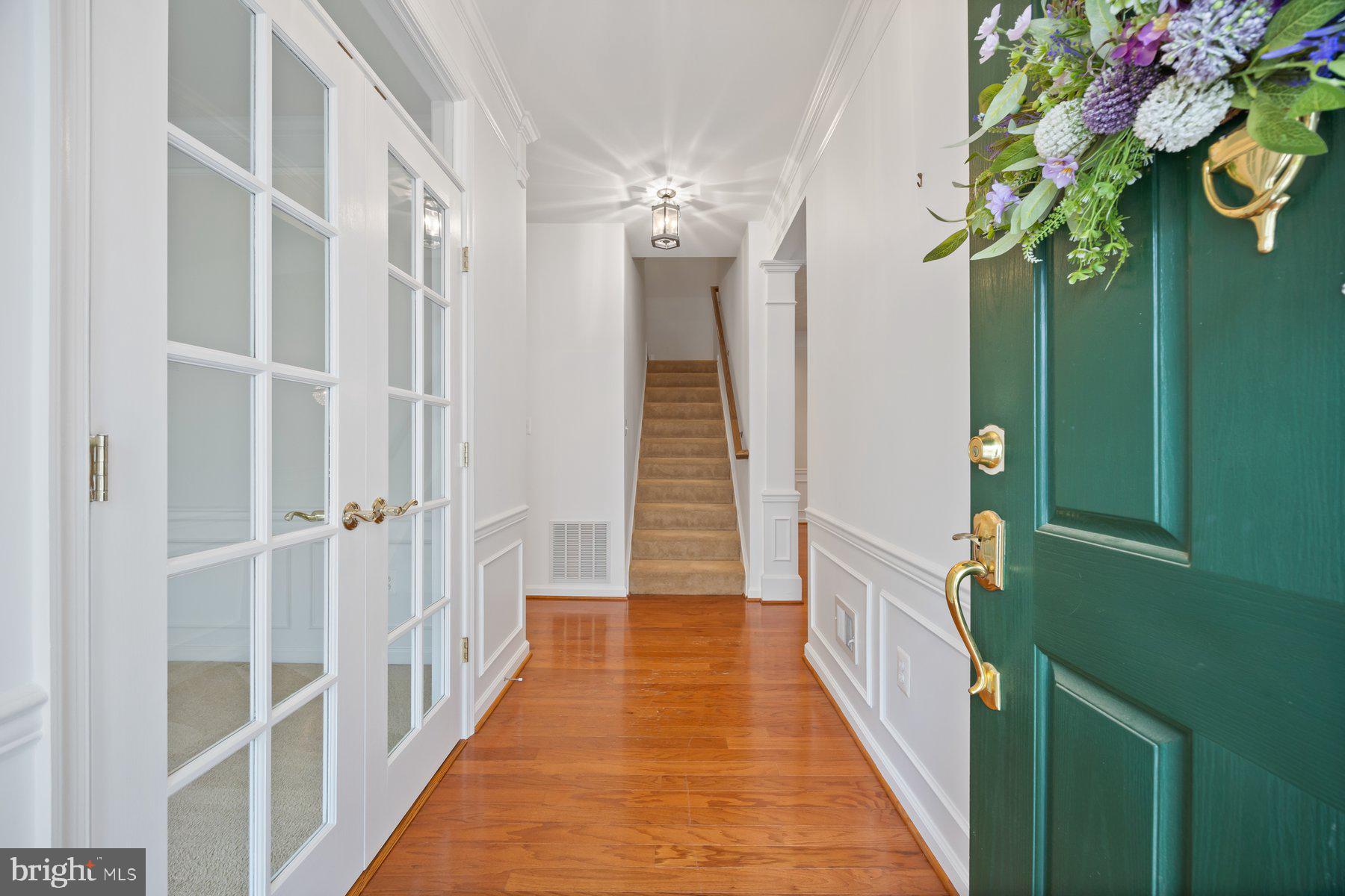 840 Horseshoe Lane, Unit 171 Taneytown, MD 21787 - Photo 3 of 37 a view of a hallway with wooden floor