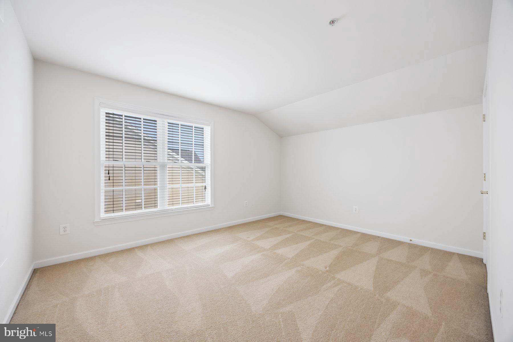 840 Horseshoe Lane, Unit 171 Taneytown, MD 21787 - Photo 30 of 37 an empty room with a window