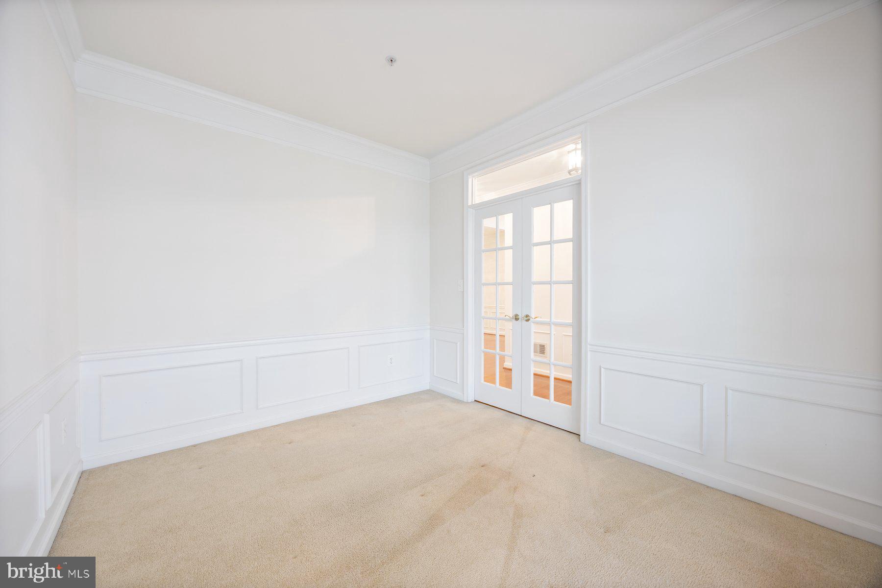 840 Horseshoe Lane, Unit 171 Taneytown, MD 21787 - Photo 4 of 37 an empty room with windows