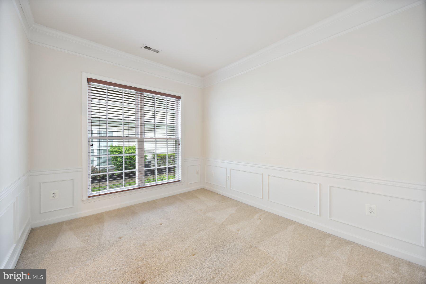 840 Horseshoe Lane, Unit 171 Taneytown, MD 21787 - Photo 5 of 37 a view of an empty room with a window