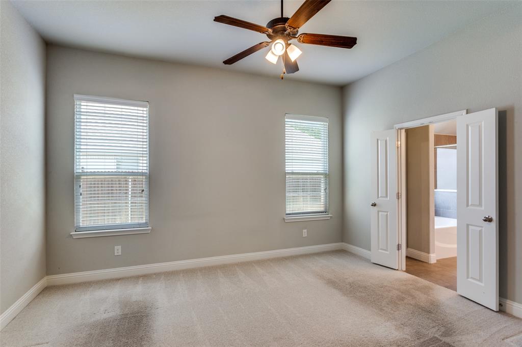 529 Inwood Street Benbrook, TX 76126 - Photo 14 of 29 a view of an empty room with a window