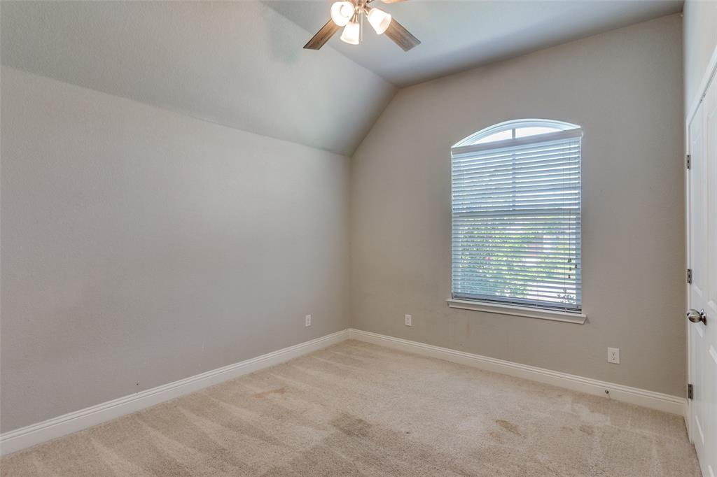 529 Inwood Street Benbrook, TX 76126 - Photo 18 of 29 an empty room with a window