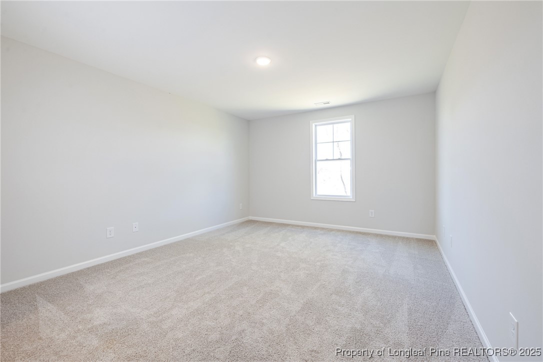 199 Palomo Place Raeford, NC 28376 - Photo 17 of 33 an empty room with a window