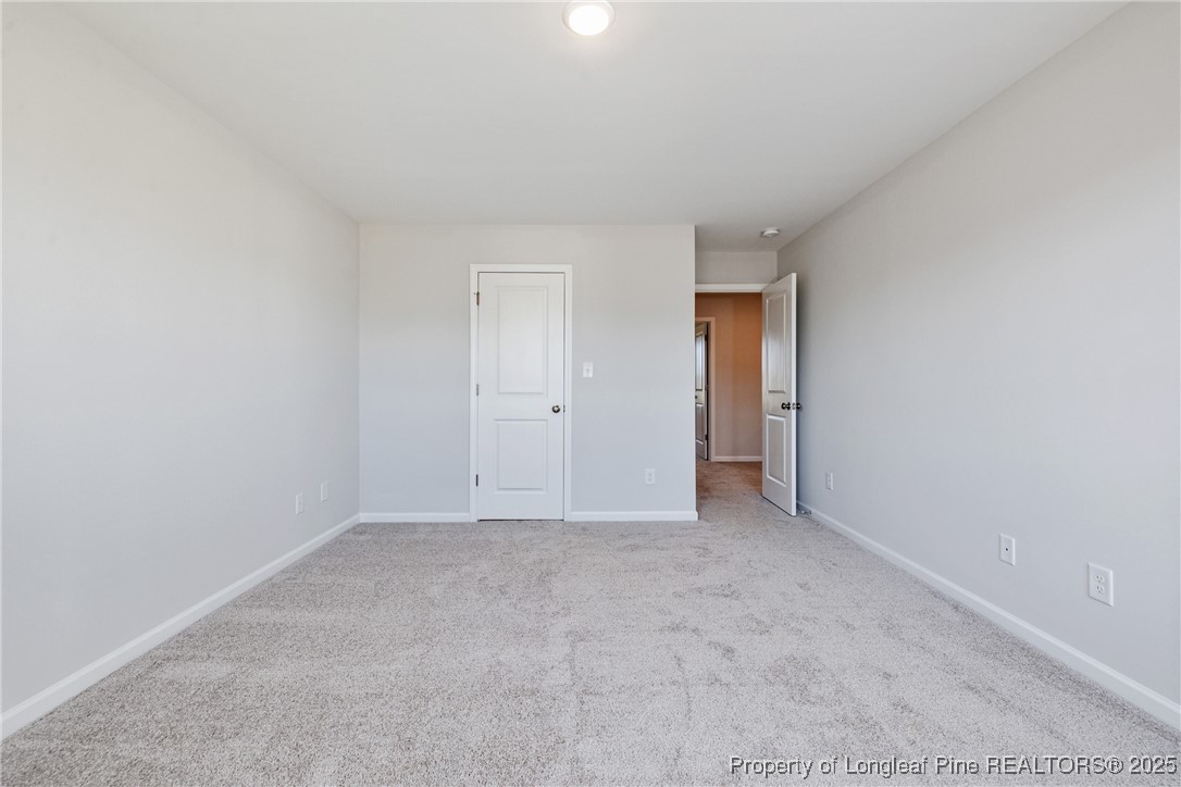 199 Palomo Place Raeford, NC 28376 - Photo 20 of 33 a view of an empty room and closet area