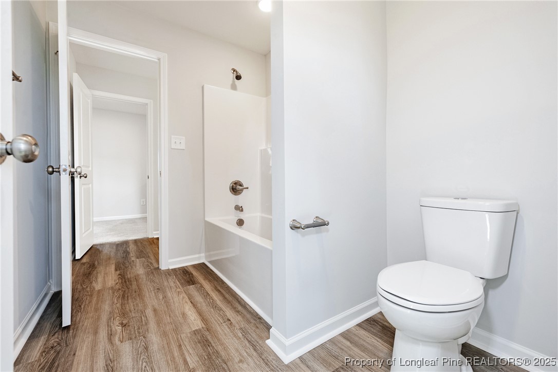 199 Palomo Place Raeford, NC 28376 - Photo 22 of 33 a bathroom with a toilet and a shower