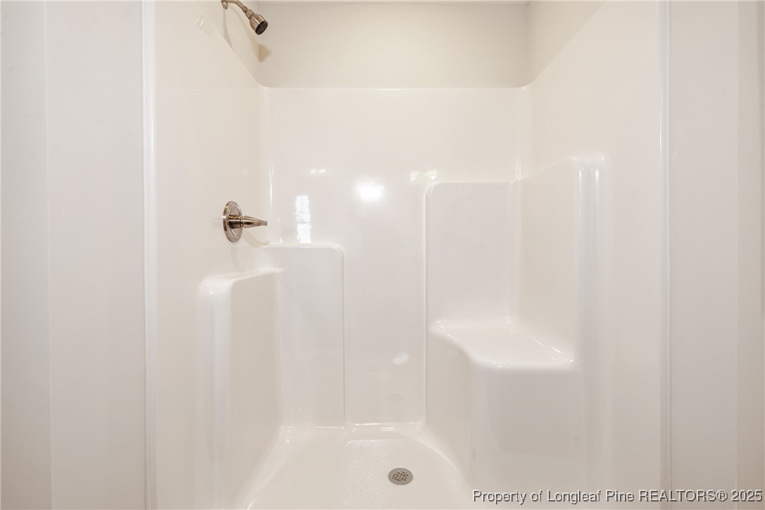 199 Palomo Place Raeford, NC 28376 - Photo 29 of 33 a bathroom with a shower