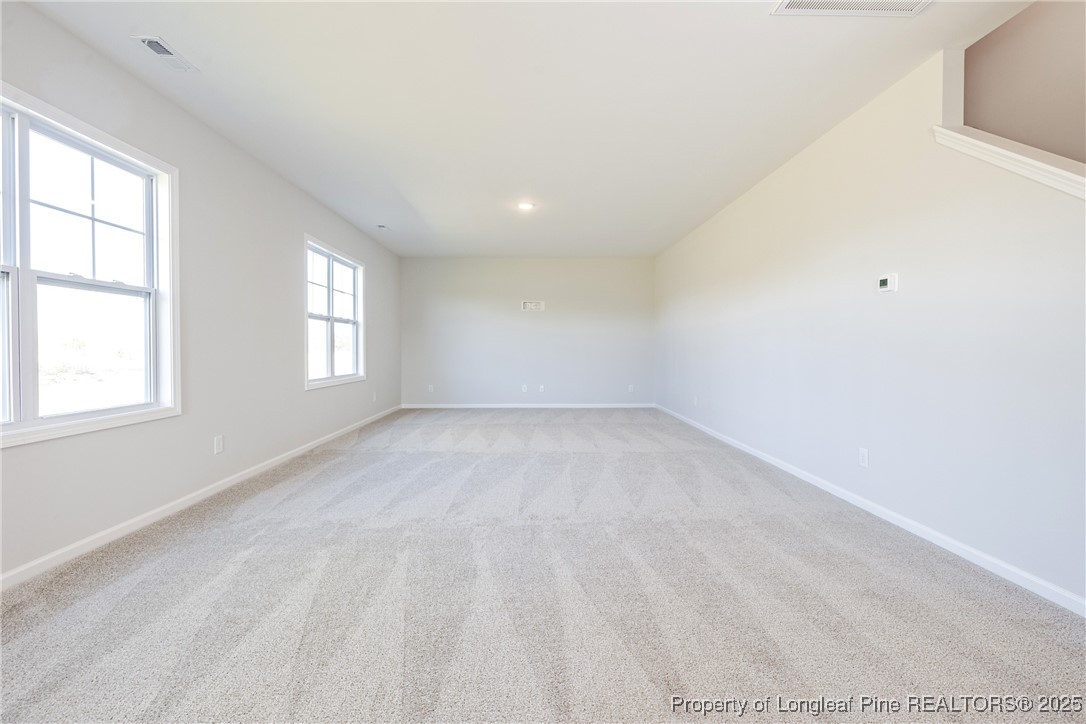 199 Palomo Place Raeford, NC 28376 - Photo 10 of 33 an empty room with windows