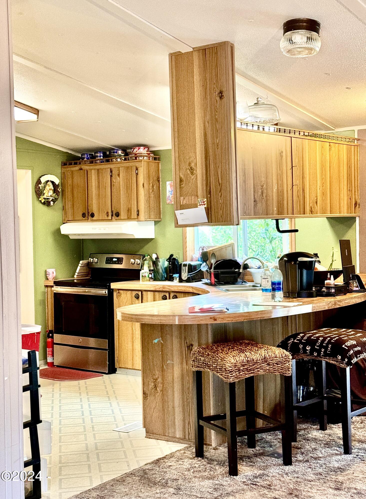 724 Southwest Ferry Avenue, Unit 73 Siletz, OR 97380 - Photo 8 of 24 Kitchen