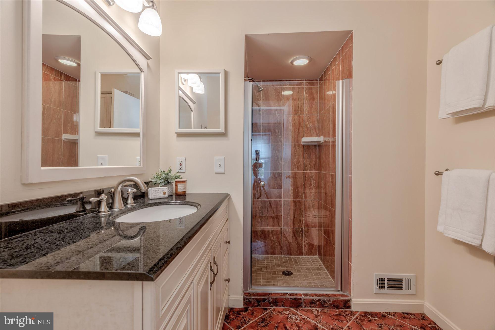 3804 Ferrara Drive Silver Spring, MD 20906 - Photo 18 of 32 Owner's Suite renovated bath