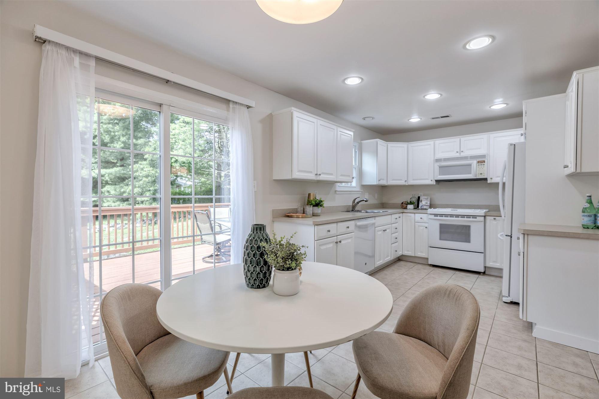 3804 Ferrara Drive Silver Spring, MD 20906 - Photo 8 of 32 Eat - in Kitchen, french doors to Deck