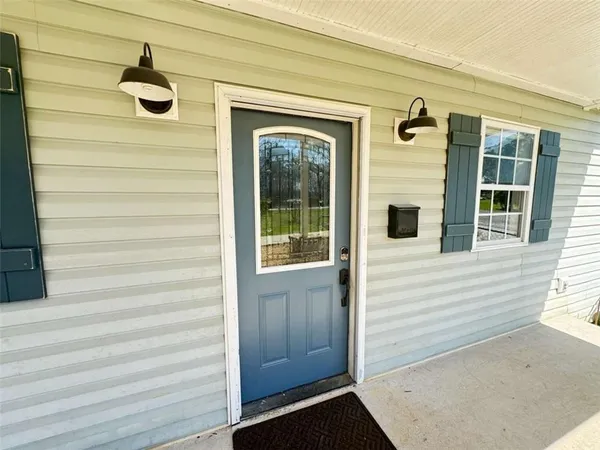 a view of front door and porch