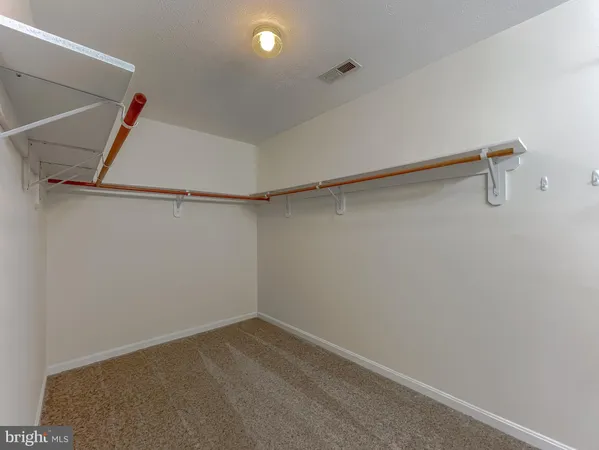 a bathroom with a tub and a sink