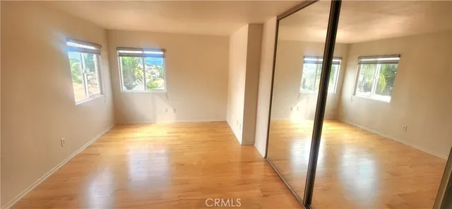 a view of a room that has a large window