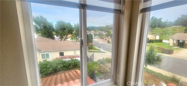 a bathroom with a toilet sink vanity and mirror