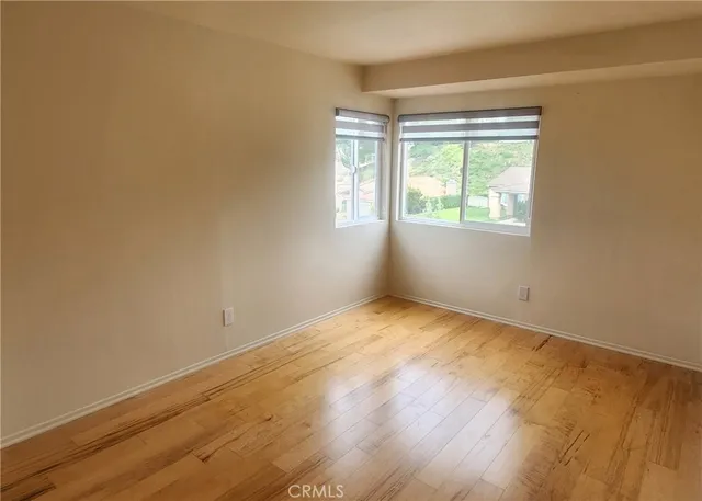 a view of a city from a room next to a window