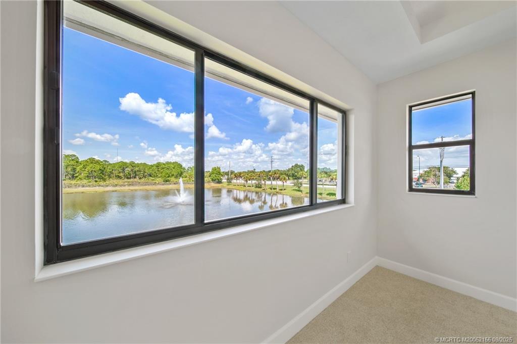 3654 Southwest Magnolia Ridge Lane Palm City, FL 34990 - Photo 17 of 23 a view of lot of room and window